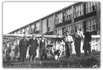 Plane production was initially directed by Mr. Dohnalek and constructed by Mr. Kryšpín. The picture was taken in front of the first school hostel in Zlin. 